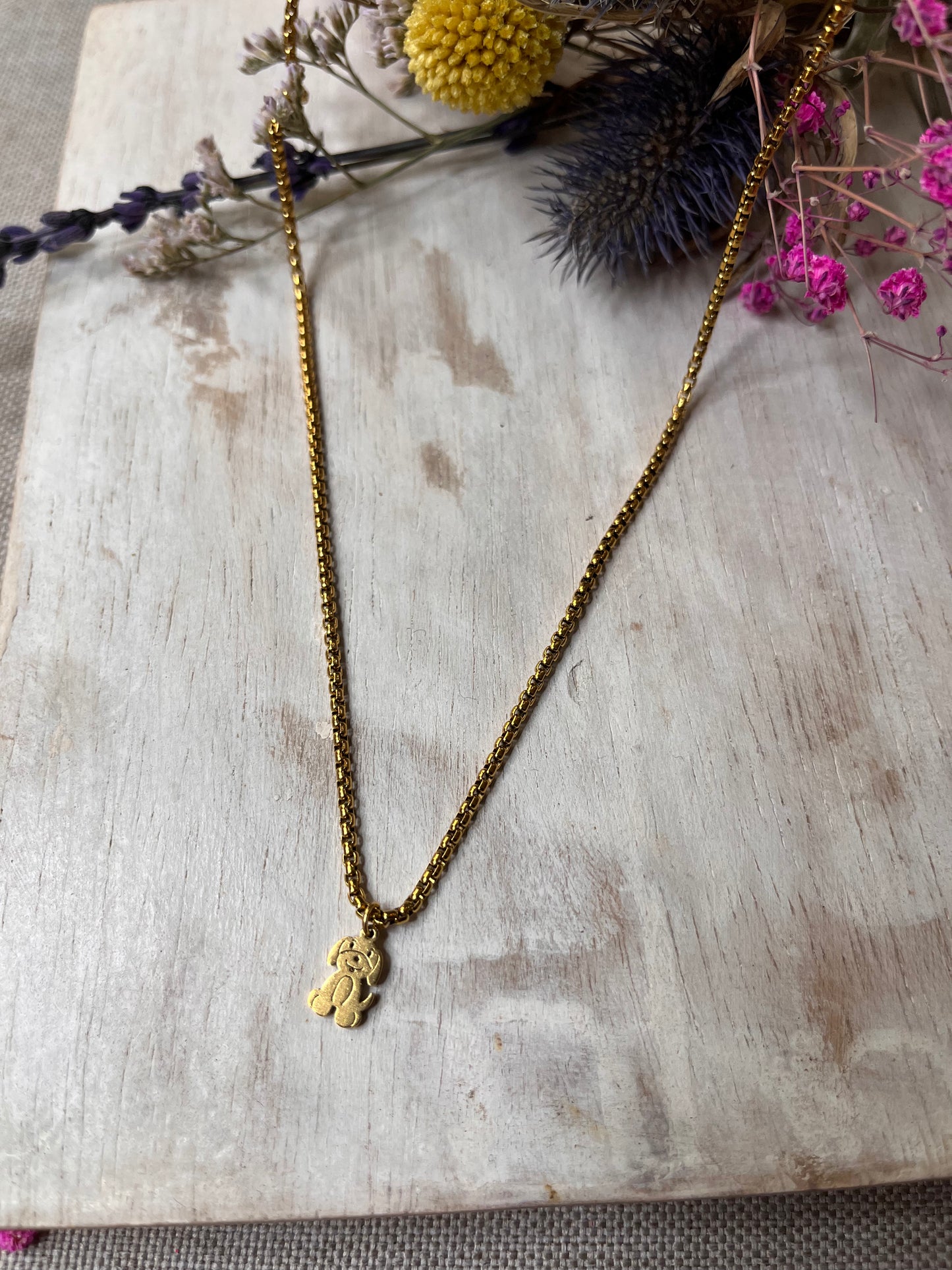 Dog pendant with gold chain