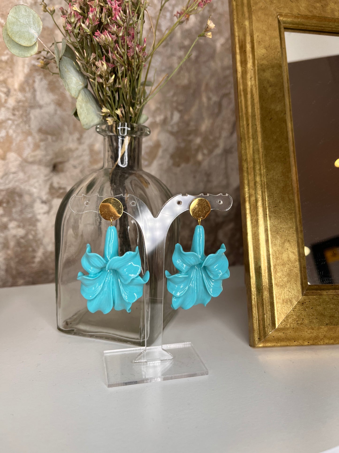 pendientes de flor de resina y acero