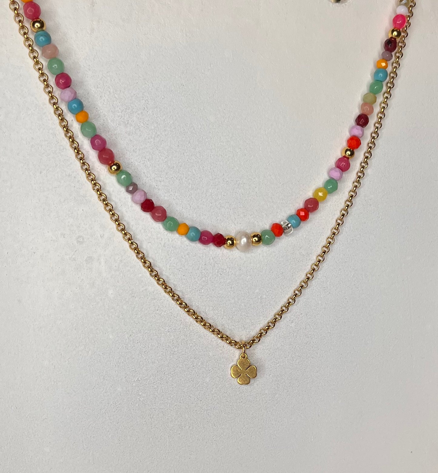 Double necklace with clover and pearl pendant