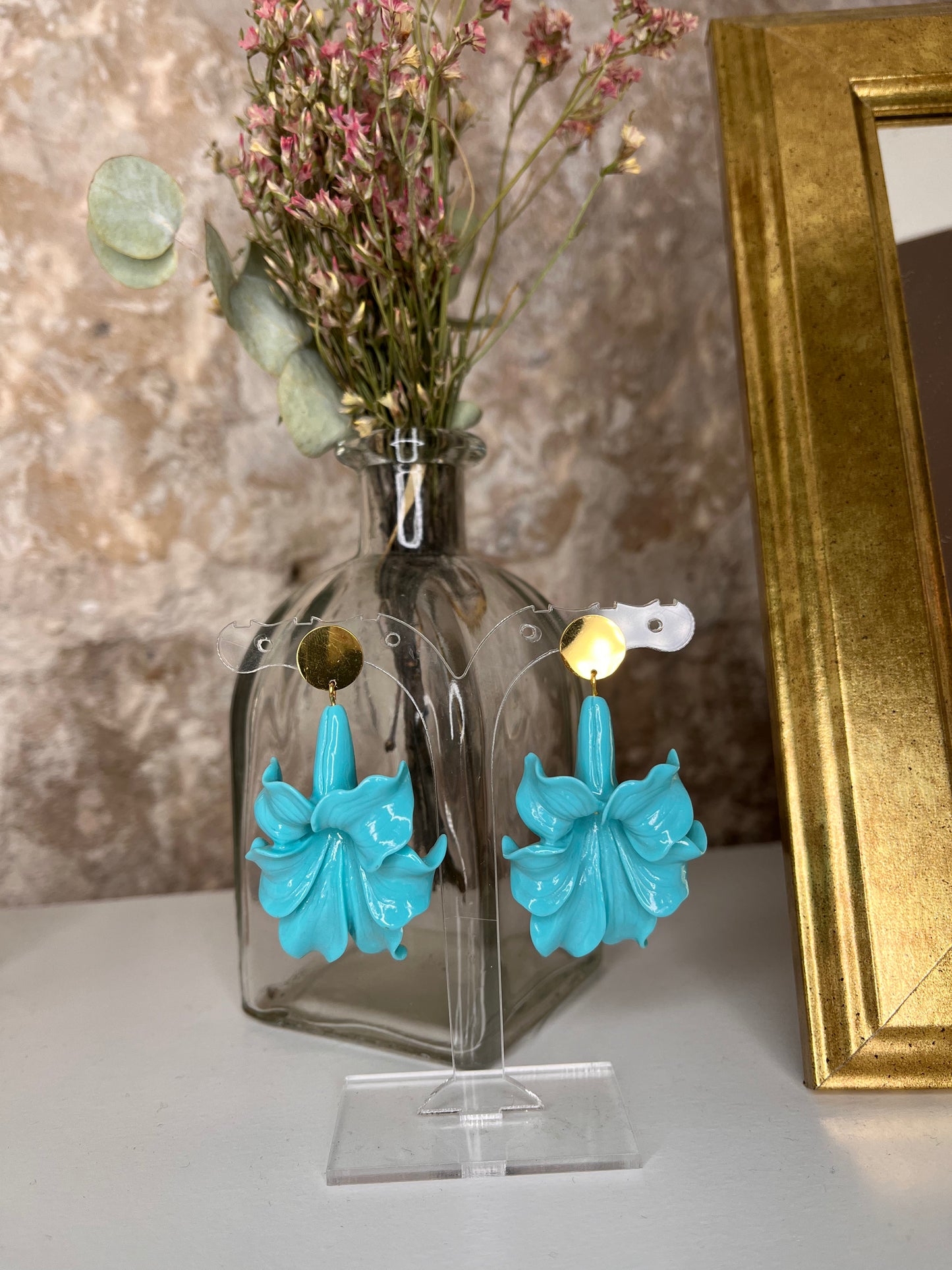 pendientes de flor de resina y acero